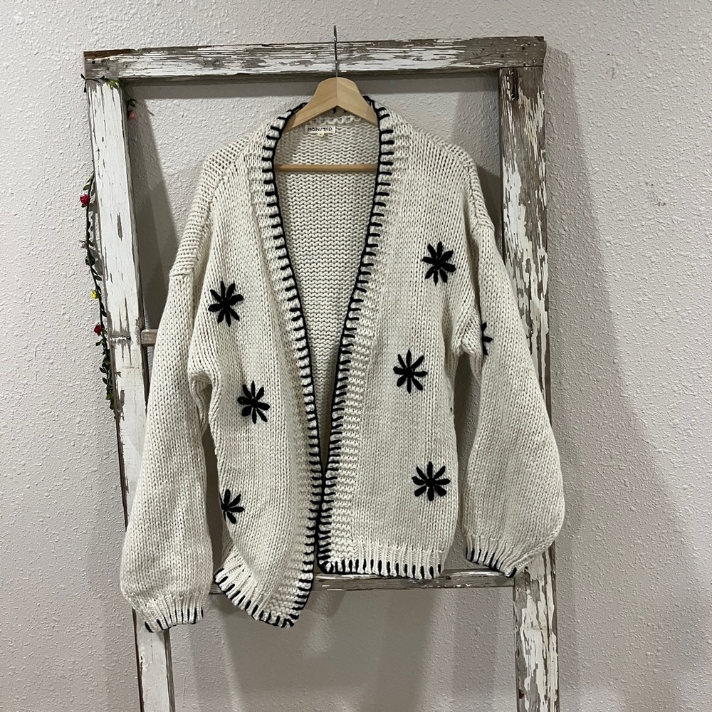 Main Strip Cream Cardigan with Black Star Accents
